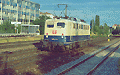 110 141-9 in Richtung München Ost (München Heimeranplatz, Juli 2001)